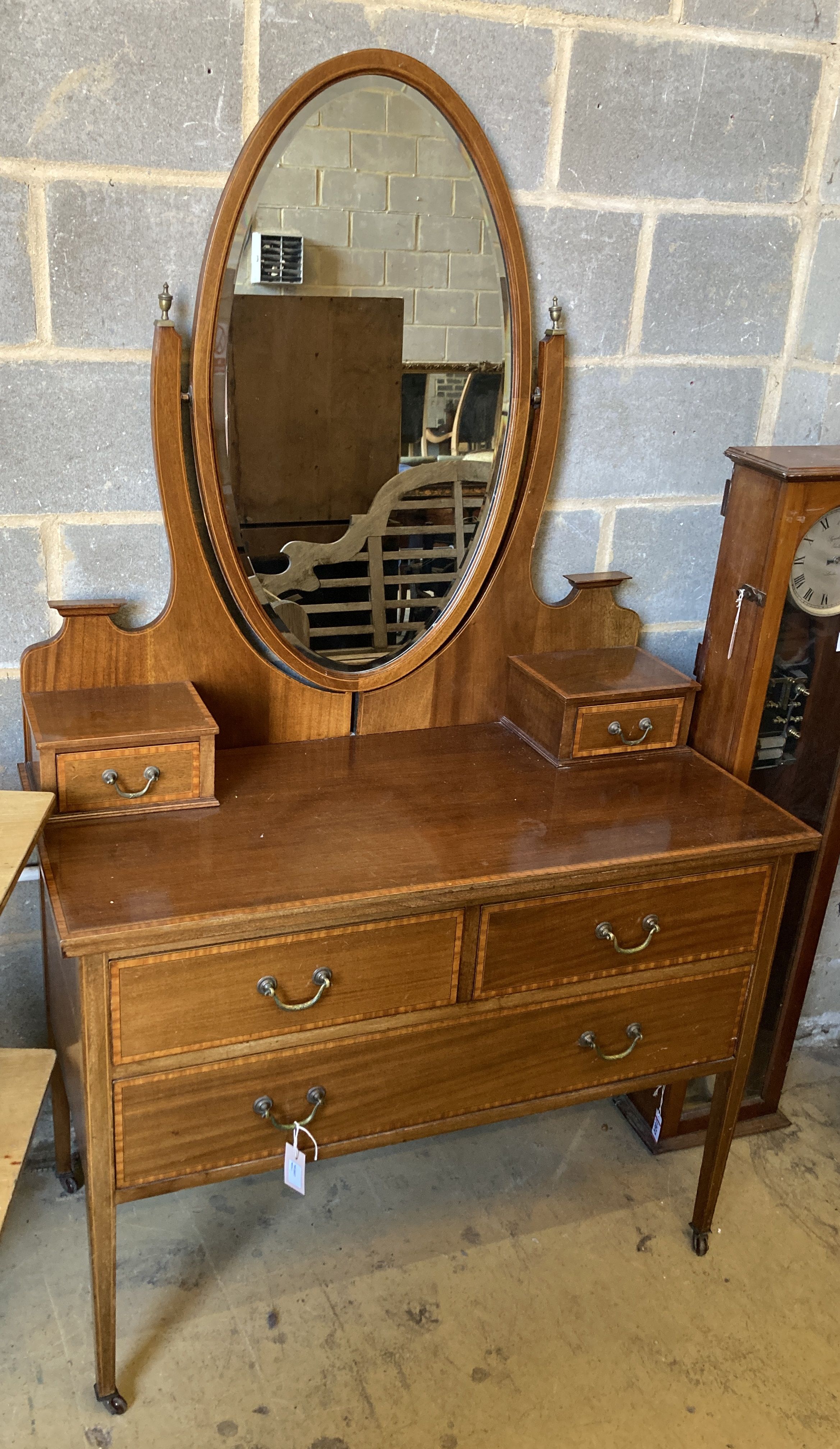 An Edwardian satinwood banded mahogany dressing table, width 107cm, depth 52cm, height 190cm